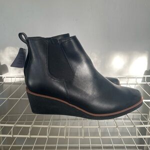 AEROSOLES Black Wedge Chelsea Ankle Boots with Brown Trim